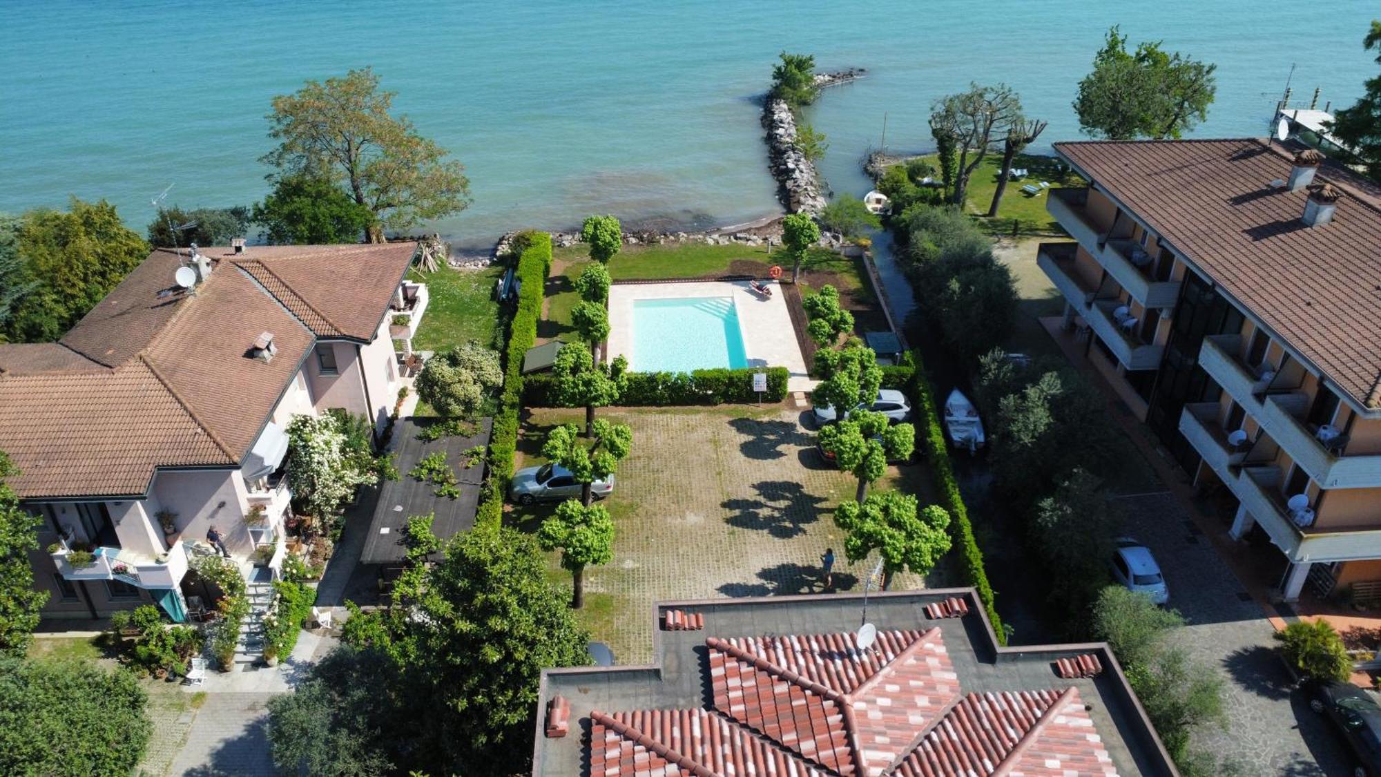 Casa Lugana 9 - Monolocale Con Piscina Fronte Lago Sirmione Exterior foto